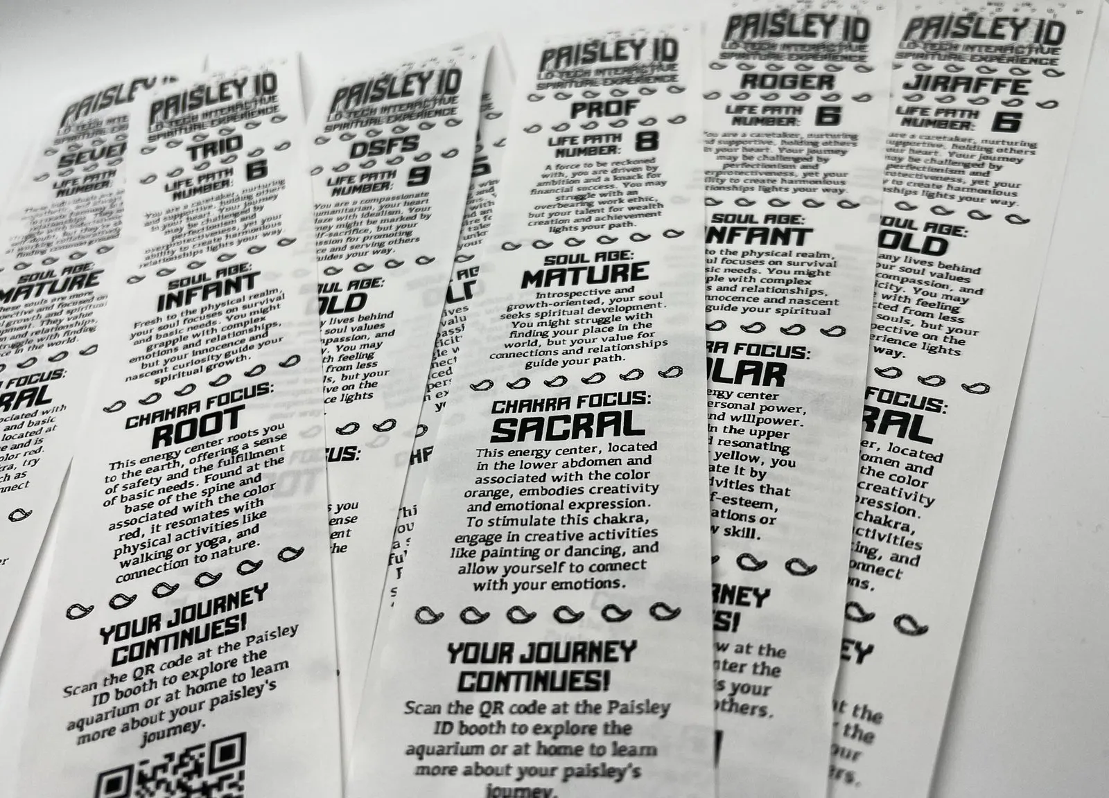 Fortune tickets spread out, each ending with a QR code to continue the journey
