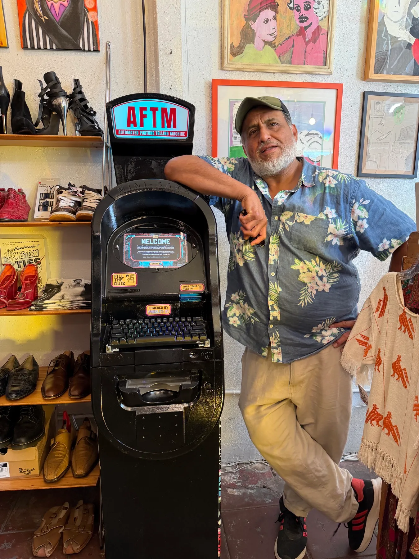 The owner of Luxe de Ville leaning on the AFTM in his store
